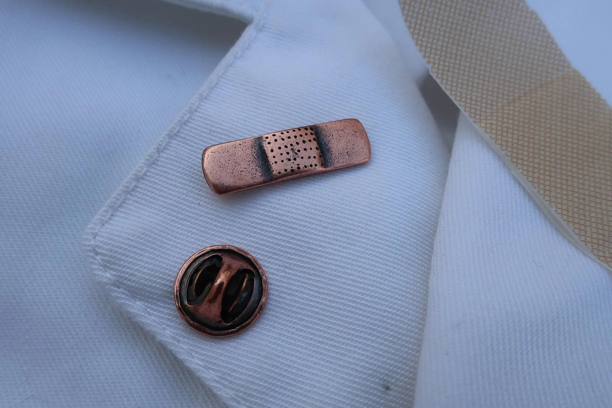 Band-Aid Copper Lapel Pin