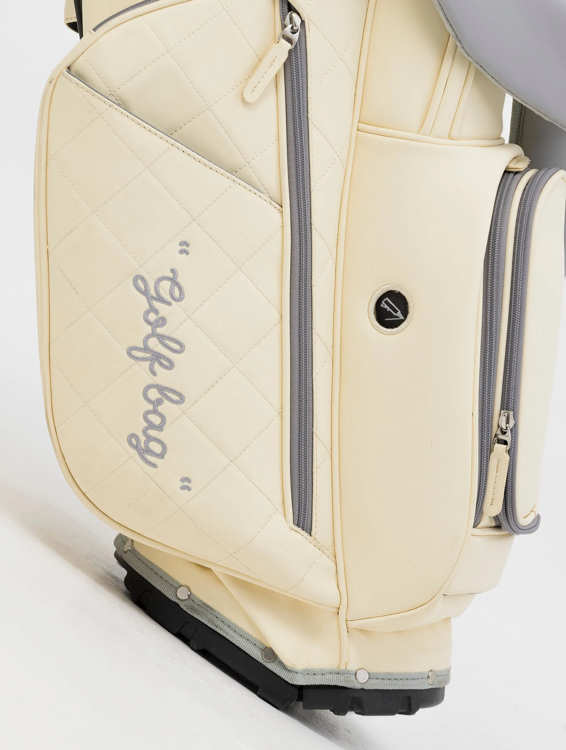 NOHOW LTD GOLF BAG IN CREAM WITH UNIQUE GREY ZIPPERS